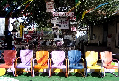 Metal Chairs on Colorful Vintage Metal Lawn Chairs Await The Arrival Of The